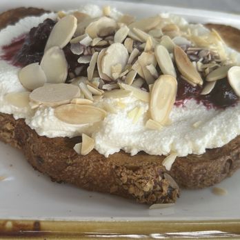 News Cafe - Ricotta Berry Toast with Shaved Almonds - Breakfast & Brunch Near Me - Miami Beach, Florida News Cafe - Ricotta Berry Toast with Shaved Almonds - Breakfast & Brunch Near Me - Miami Beach, Florida