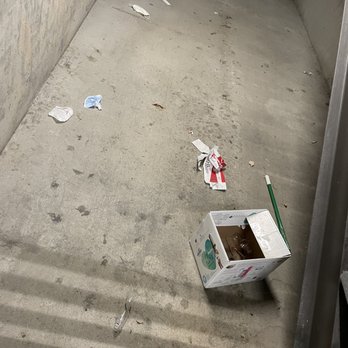 Domain San Diego - Trash is very common around the complex. This trash remained underneath this specific staircase for about 3 weeks. - Apartments Near Me - San Diego, California