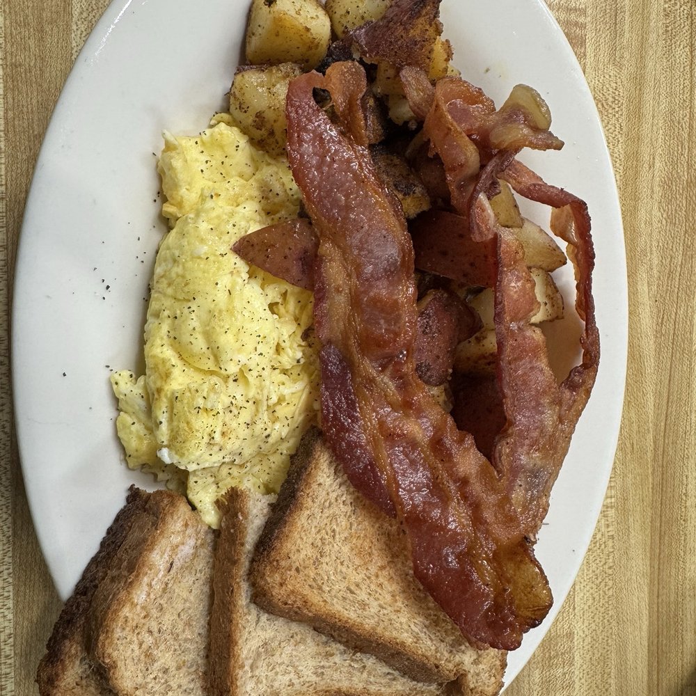 Corner Cafe - 2 Eggs, Home Fries, Toast, Choice of Bacon, Ham or Sausage - Cafes Near Me - Stoughton, Massachusetts Corner Cafe - 2 Eggs, Home Fries, Toast, Choice of Bacon, Ham or Sausage - Cafes Near Me - Stoughton, Massachusetts