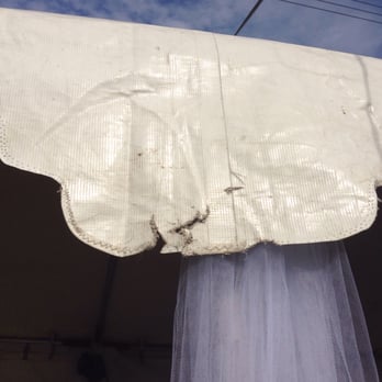 Celebrations Party Rental - Frayed/ripped front of tent. - Party Supplies Near Me - Stanton, California