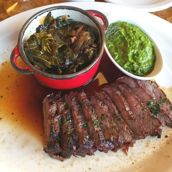 Nana Steak - Flank steak, chimichurri sauce, and braised collard greens - Steakhouses Near Me - Durham, North Carolina