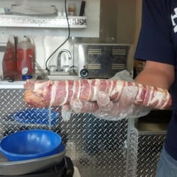 Wings On Wheels - Triple play hot dog. Hot dog wrapped with ground beef then wrapped in bacon.