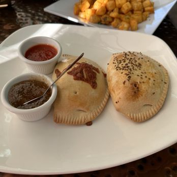 Best Artisan Empanadas - Chicken Cilantro and Sausage egg n Cheese Empanadas served with Mango and Spicy chutneys!! Damn , these are good! - Coffee & Tea Near Me - Campbell, California