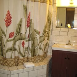Dolphin Bay Hotel - Bathroom is clean. Hairdryer is underneath the sink. Comes with free soap and earplugs.