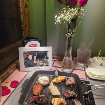 The Melting Pot - You can see my roses and our picture in this photo as well as us cooking our meat on the Little Grill - Fondue Near Me - Boca Raton, Florida The Melting Pot - You can see my roses and our picture in this photo as well as us cooking our meat on the Little Grill - Fondue Near Me - Boca Raton, Florida