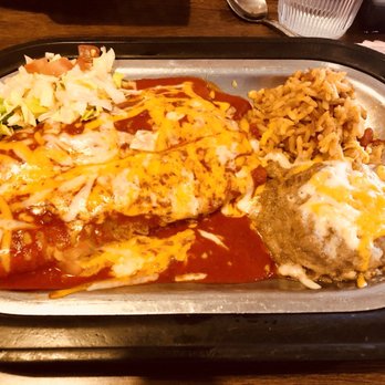 Virgie Restaurant & Lounge - Half order of ground beef enchiladas with Spanish rice, refried beans with red Chile sauce - Mexican Near Me - Gallup, New Mexico Virgie Restaurant & Lounge - Half order of ground beef enchiladas with Spanish rice, refried beans with red Chile sauce - Mexican Near Me - Gallup, New Mexico