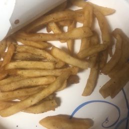 Black flakes is not pepper, but burnt crispy stuff. We threw our food away.