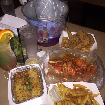 theBoil - My cousin ate the lobster. I dipped my chicken in his lobster sauce and that was good. - Cajun/Creole Near Me - New York, New York theBoil - My cousin ate the lobster. I dipped my chicken in his lobster sauce and that was good. - Cajun/Creole Near Me - New York, New York