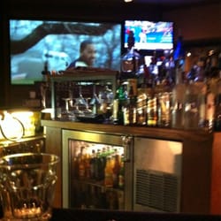 Champs Sports - Large screen tv's surround the bar area
