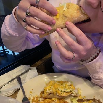 Rio Rico Mexican Grill - My daughter enjoying her tacos - Mexican Near Me - Gilbert, Arizona Rio Rico Mexican Grill - My daughter enjoying her tacos - Mexican Near Me - Gilbert, Arizona