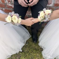Lompoc Valley Florist - Two white rose corsages wristlet