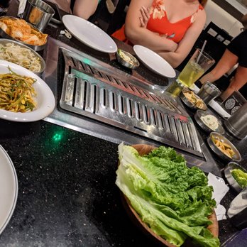 Hoban Korean BBQ - a group of people sitting at a table - Korean Near Me - Minneapolis, Minnesota