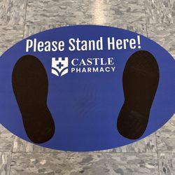 Castle Pharmacy - Castle Pharmacy floor mat showing where to stand when waiting