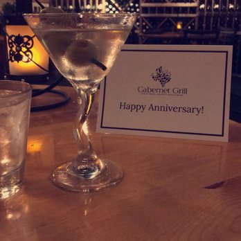 Cabernet Grill - Dirty martini, with the cute anniversary card from Cabernet Grill, in the very beautiful upstairs room left of the stairs. - Seafood Near Me - Fredericksburg, Texas