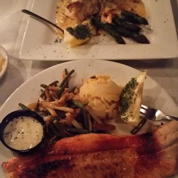 Alexander's - Salmon ala Oscar on top of asparagus $31 and Broiled Door County Whitefish $19 - Seafood Near Me - Fish Creek, Wisconsin
