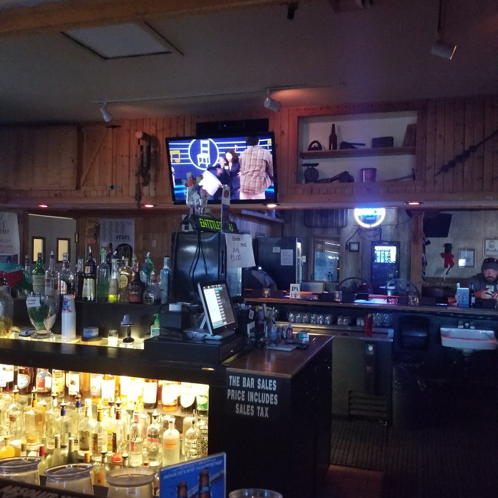 Rustic Lounge - a bar with a large screen tv - Dive Bars Near Me - Henderson, Nevada Rustic Lounge - a bar with a large screen tv - Dive Bars Near Me - Henderson, Nevada
