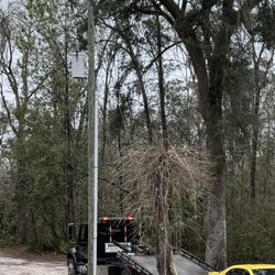 Tri-County Towing & Recovery - Loading this car onto flat bed - did end up hooking from the front