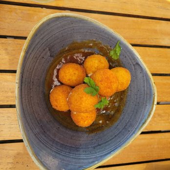 American Social - Goat cheese fritters - Bars Near Me - Tampa, Florida American Social - Goat cheese fritters - Bars Near Me - Tampa, Florida