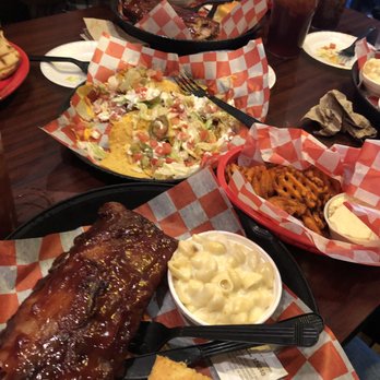 Pig In A Poke - Ribs, white cheddar macaroni n cheese, brisket nachos, sweet potato fries, honey butter. - American Near Me - Prestonsburg, Kentucky