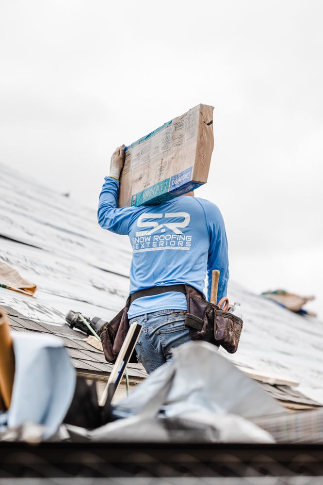 Slide of Snow Roofing and Exteriors