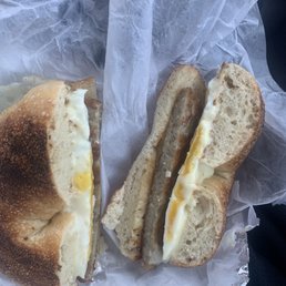 a bagel sandwich with egg and cheese a bagel sandwich with egg and cheese