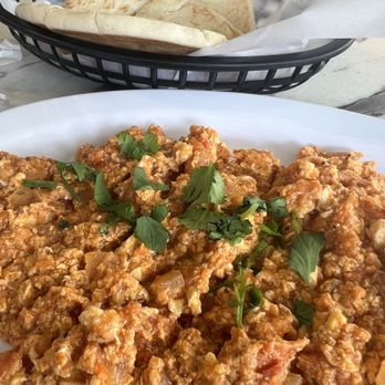 Kareem's - Scrambled eggs with tomatoes , served with fresh pita breads - Mediterranean Near Me - Anaheim, California Kareem's - Scrambled eggs with tomatoes , served with fresh pita breads - Mediterranean Near Me - Anaheim, California
