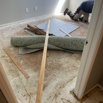 JWS Floor Covering - a man working on the floor - Flooring Near Me JWS Floor Covering - a man working on the floor - Flooring Near Me