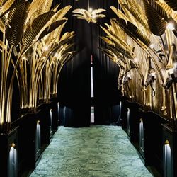 Lele - Golden lit hallway.