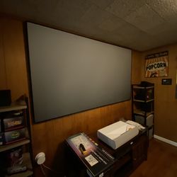 Blount Media - Fixed Grandview screen with Ultra Short Throw projector.