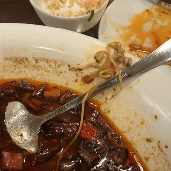 Yi Pin - look at the black spots. There are a lot more inside the dish. - Chinese Near Me - Derwood, Maryland Yi Pin - look at the black spots. There are a lot more inside the dish. - Chinese Near Me - Derwood, Maryland