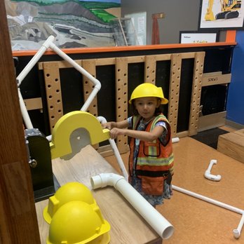 Kids In Motion - Construction girl. - Playgrounds Near Me - New Berlin, Wisconsin Kids In Motion - Construction girl. - Playgrounds Near Me - New Berlin, Wisconsin