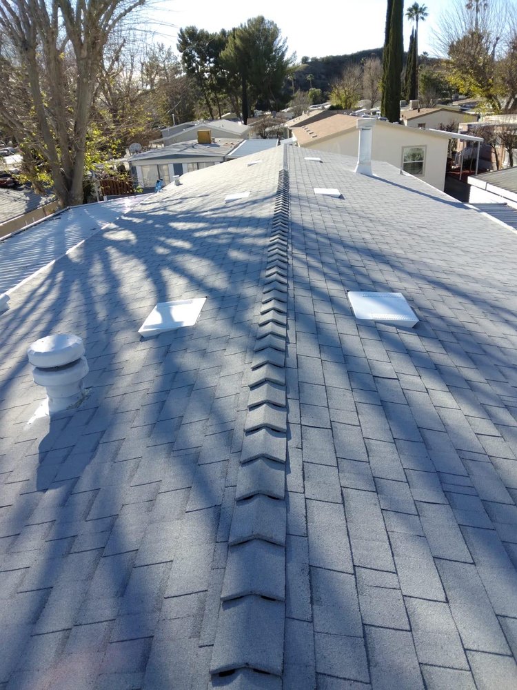 Slide of All American Construction and Roofing