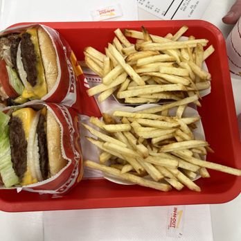 In-N-Out Burger - ows a tray of fries and a hamburger - Burgers Near Me - Denver, Colorado In-N-Out Burger - ows a tray of fries and a hamburger - Burgers Near Me - Denver, Colorado