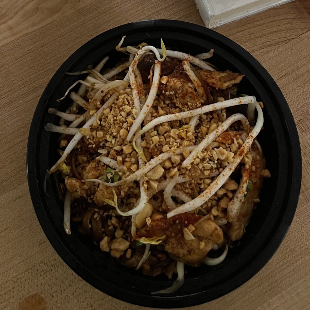 a bowl of food on a table a bowl of food on a table