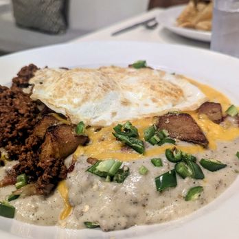 Northside Kitchenette - Biscuits and sausage gravy, chorizo, serranos, eggs, cheese and potatoes. Yum! - Soup Near Me - Indianapolis, Indiana