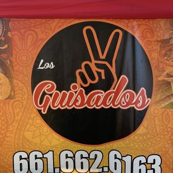Los Guisados - a sign for a mexican restaurant - Food Trucks Near Me - Bakersfield, California Los Guisados - a sign for a mexican restaurant - Food Trucks Near Me - Bakersfield, California