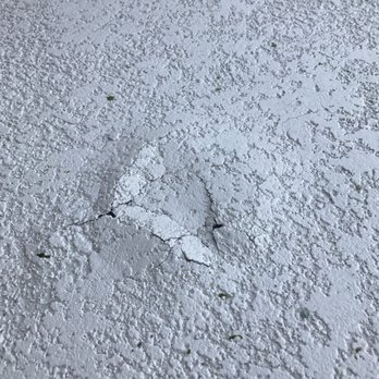 Allied Coatings - Morning after 1st rain.  Deck bubbled up and cracked. - Flooring Near Me - Vista, California