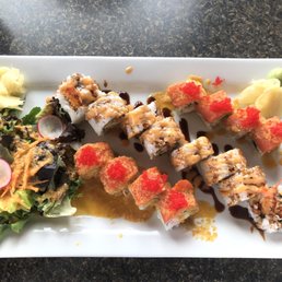 Dynamite roll(middle), Alaskan roll (with fish eggs on top) Dynamite roll(middle), Alaskan roll (with fish eggs on top)