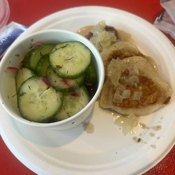 Pierogi Bros - Pierogis and Dill Cucumber Salad - Dim Sum Near Me - Sanford, Florida Pierogi Bros - Pierogis and Dill Cucumber Salad - Dim Sum Near Me - Sanford, Florida