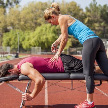 Jamie Culhane DC - Activator adjustment on site, light force technique at Oaks Christian Track Meet. - Chiropractors Near Me - Thousand Oaks, California Jamie Culhane DC - Activator adjustment on site, light force technique at Oaks Christian Track Meet. - Chiropractors Near Me - Thousand Oaks, California