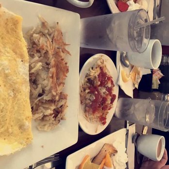 Nudy's Cafe - Cheese omelet, peaches and cream French toast, and banana pancakes with strawberry's - American Near Me - Wayne, Pennsylvania