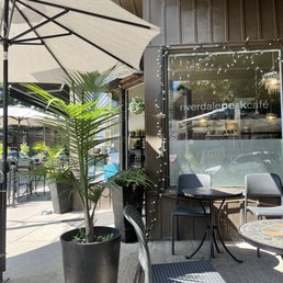 patio area with tables and umbrellas