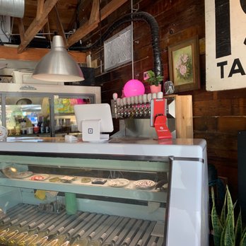 Cullum's Attagirl - The cash register and drinks fridge. - Chicken Wings Near Me - San Antonio, Texas Cullum's Attagirl - The cash register and drinks fridge. - Chicken Wings Near Me - San Antonio, Texas