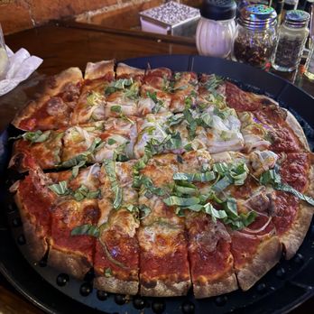 Louie's - Large pizza with Italian sausage, peppers & fresh basil. - Dive Bars Near Me - Dallas, Texas