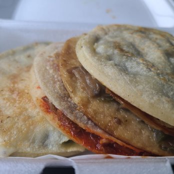 Gordillas - a close up view of some food in a styrofoam container - Mexican Near Me - Chicago, Illinois Gordillas - a close up view of some food in a styrofoam container - Mexican Near Me - Chicago, Illinois