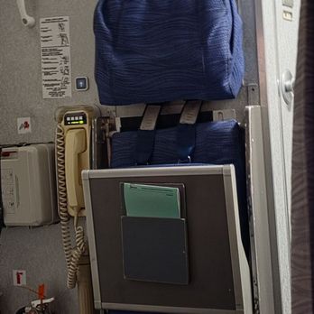 Air Canada - Attendants seat, old as dirt - Airlines Near Me - Boston, Massachusetts Air Canada - Attendants seat, old as dirt - Airlines Near Me - Boston, Massachusetts