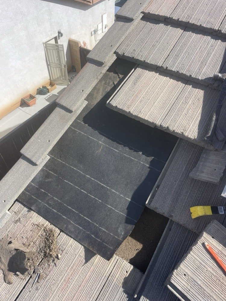 Slide of A Town Roofing