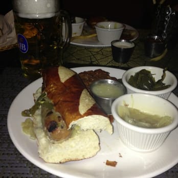 Prost - Hofbrau Munchen original lager, bratwurst with peppers and onions, potato pancakes with applesauce on side. - German Near Me - Garden City, New York