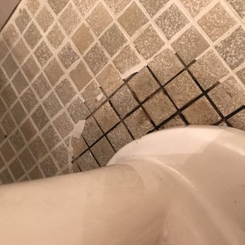 ReNew Wheaton Center by Trinity Property Consultants - Floor is cleaned. It doesn't appear they regrouted it but they removed all the gunk - Apartments Near Me - Wheaton, Illinois