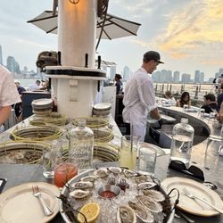 Grand Banks - Oysters and cocktails at oyster bar immediately